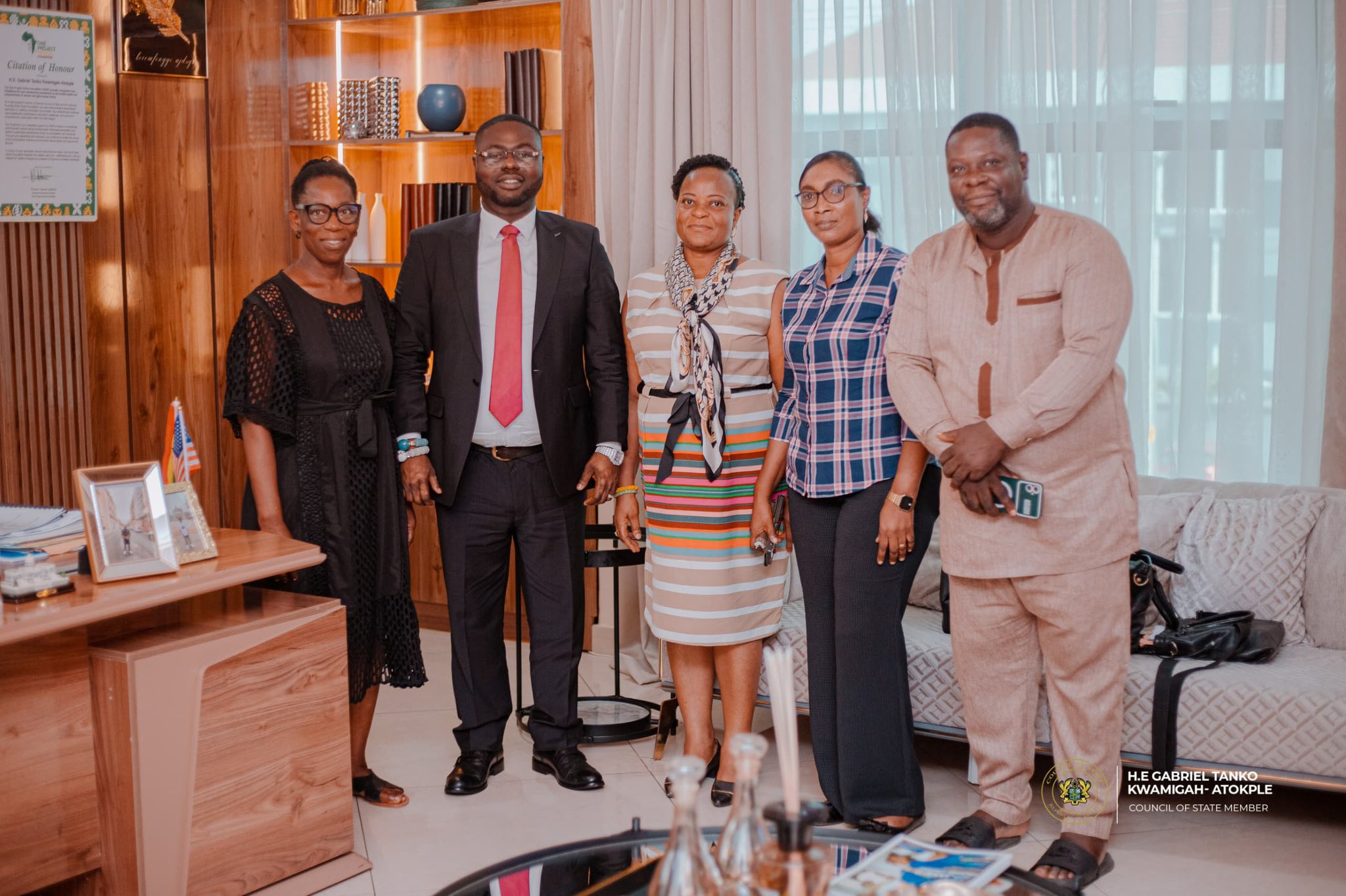 Gabriel Atokple discusses cross-border trade challenges with National Cross Border Women Traders Association