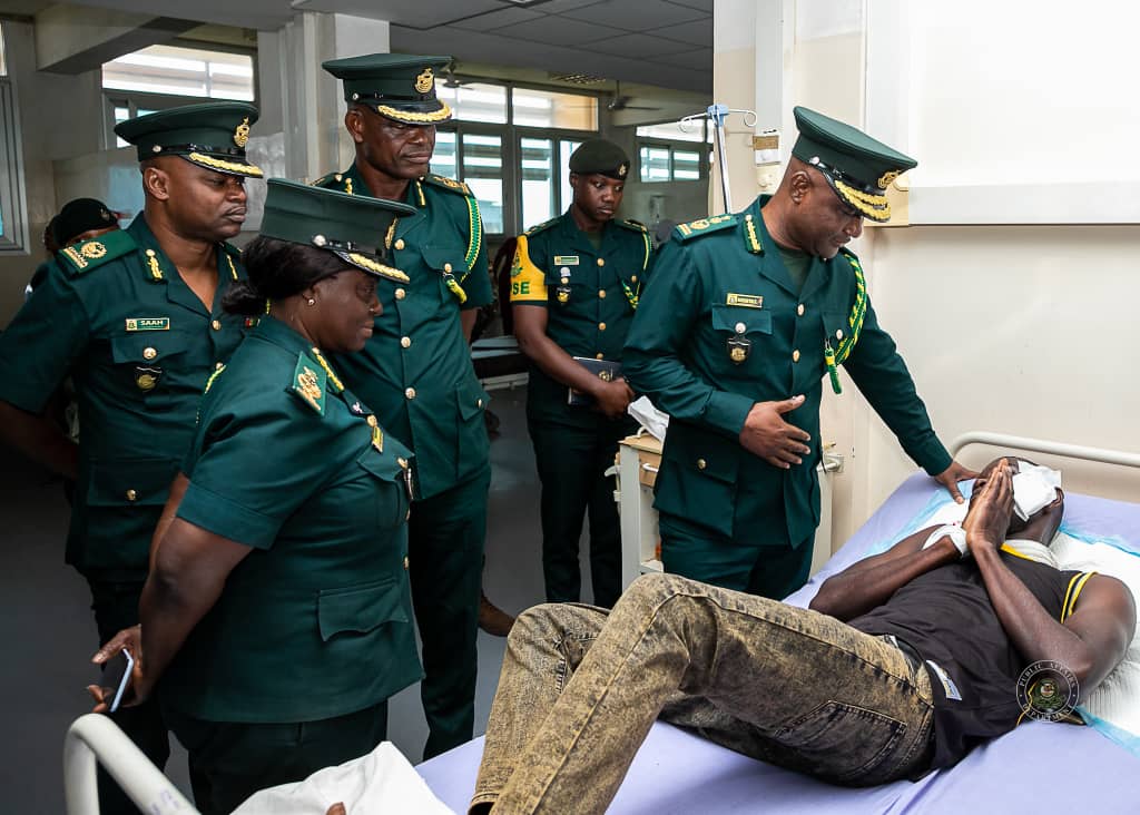Immigration Boss Samuel Basintale Amadu, visits AICO II Daniel Kofi Oppong at Tamale Teaching Hospital