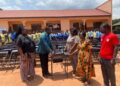 MCE Rev. Amenaki hands over 500 Desks to Dzodze Technical Institute