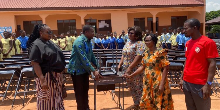 MCE Rev. Amenaki hands over 500 Desks to Dzodze Technical Institute